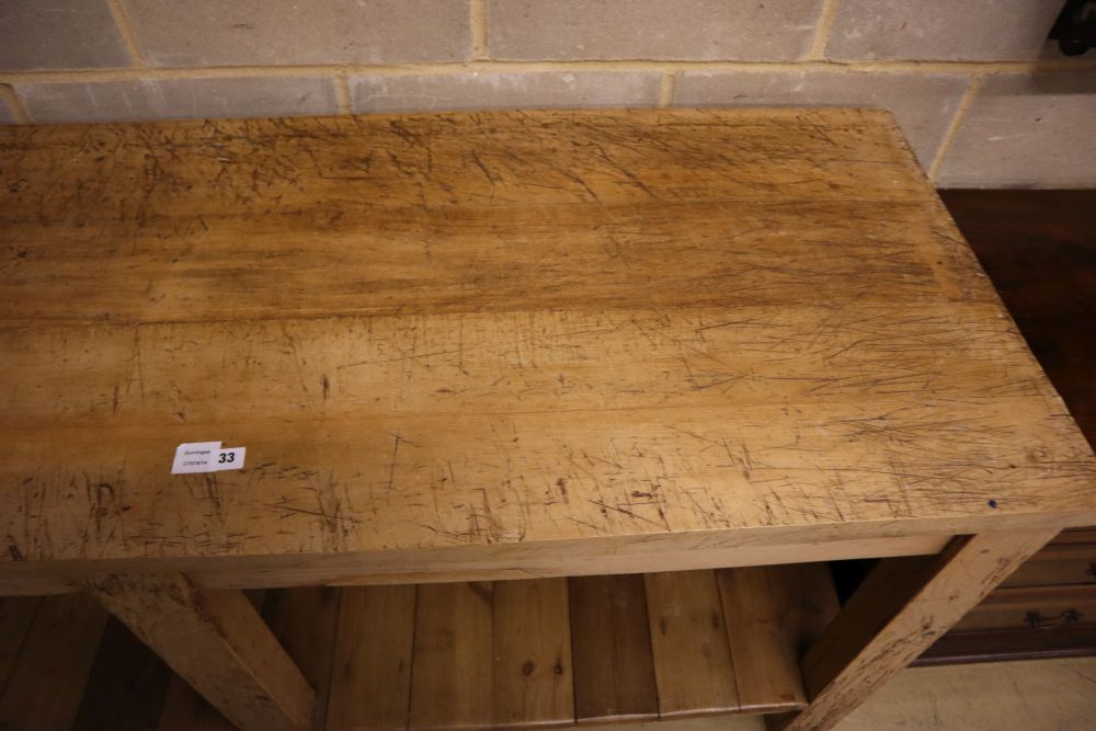 A Victorian beech and pine two tier kitchen table, width 183cm depth 65cm height 87cm